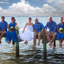 Simple Outside Ceremony Everyone Posing on Pier